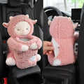 Soft plush car tissue box and trash can combo in pink rabbit design on a car armrest.