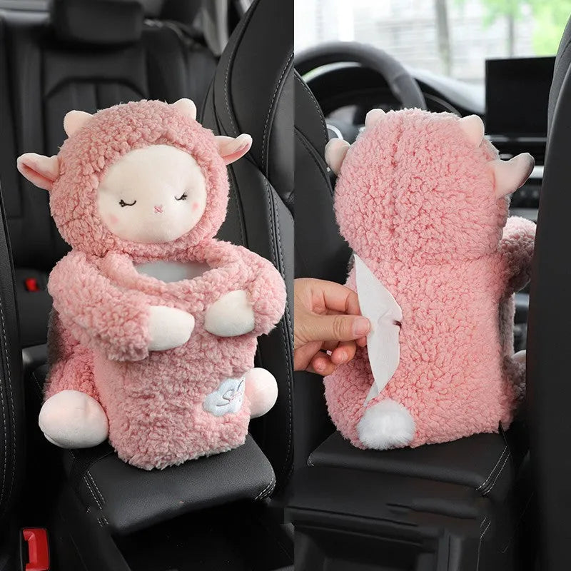 Soft plush car tissue box and trash can combo in pink rabbit design on a car armrest.