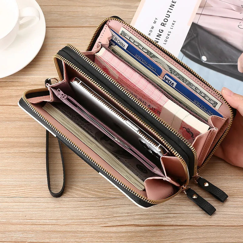 Long black PU leather wallet clutch with retro styling, open to show mobile phone compartment and coin purse sections