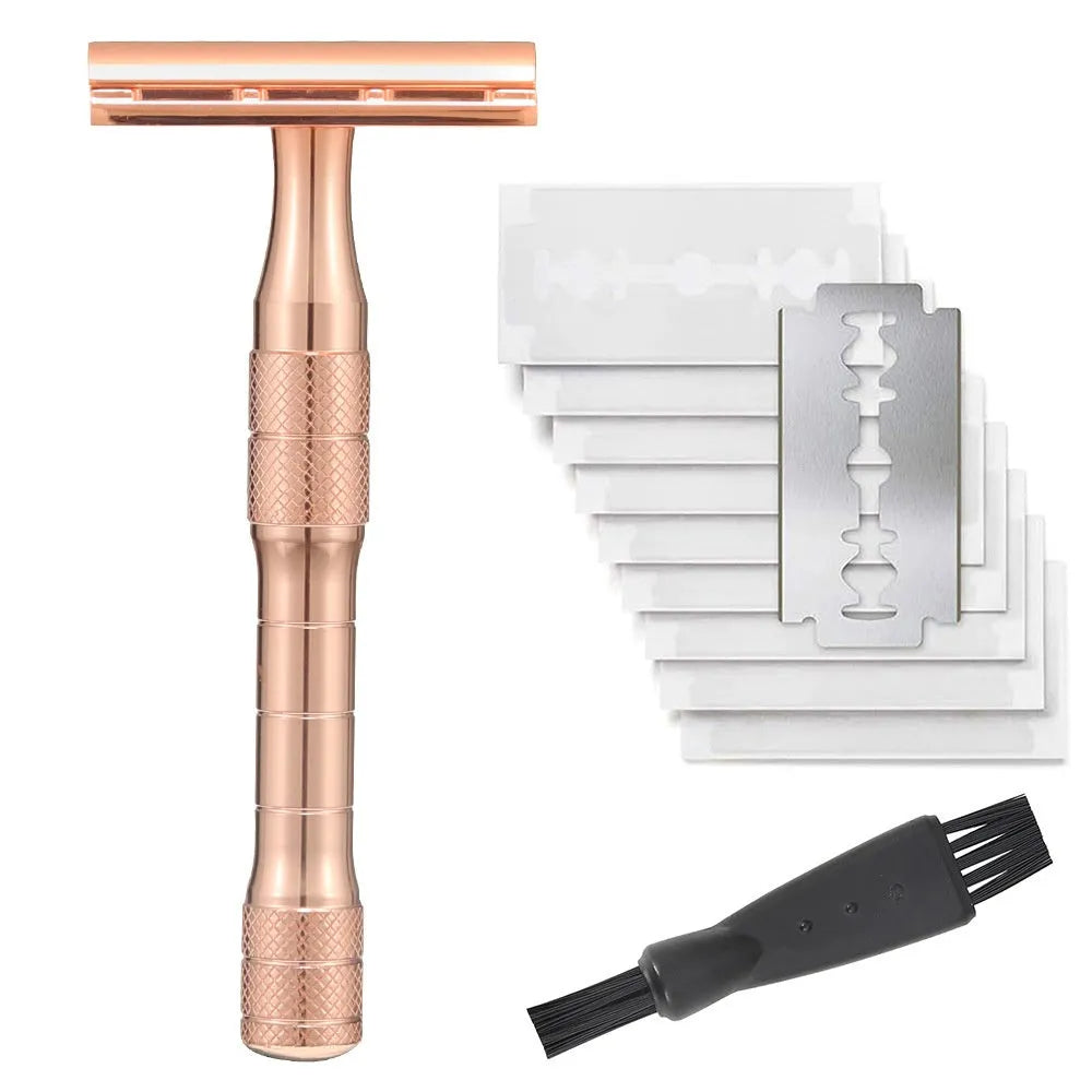 Manual double-sided safety razor with alloy handle, shown with replacement blades on a towel.