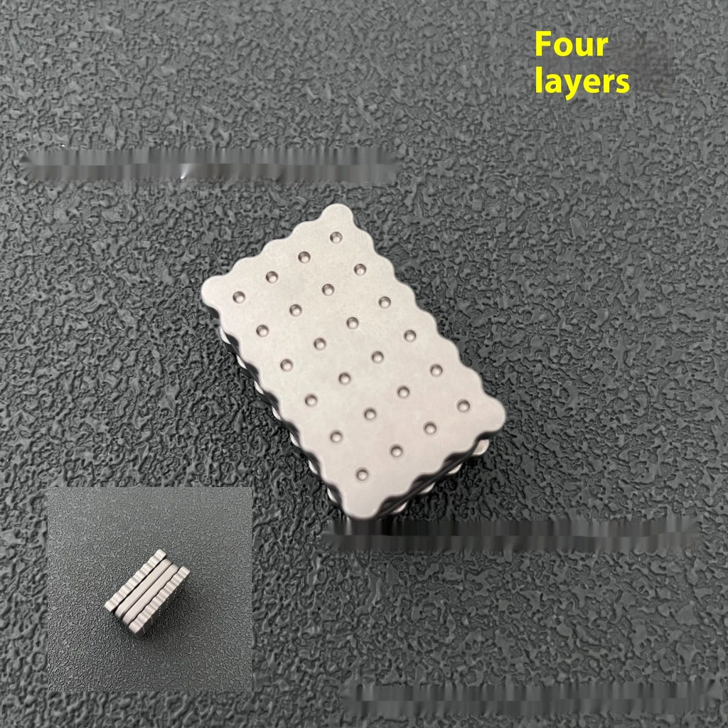 Biscuit silver 3-layer metal EDC fidget push card decompression toy on white background