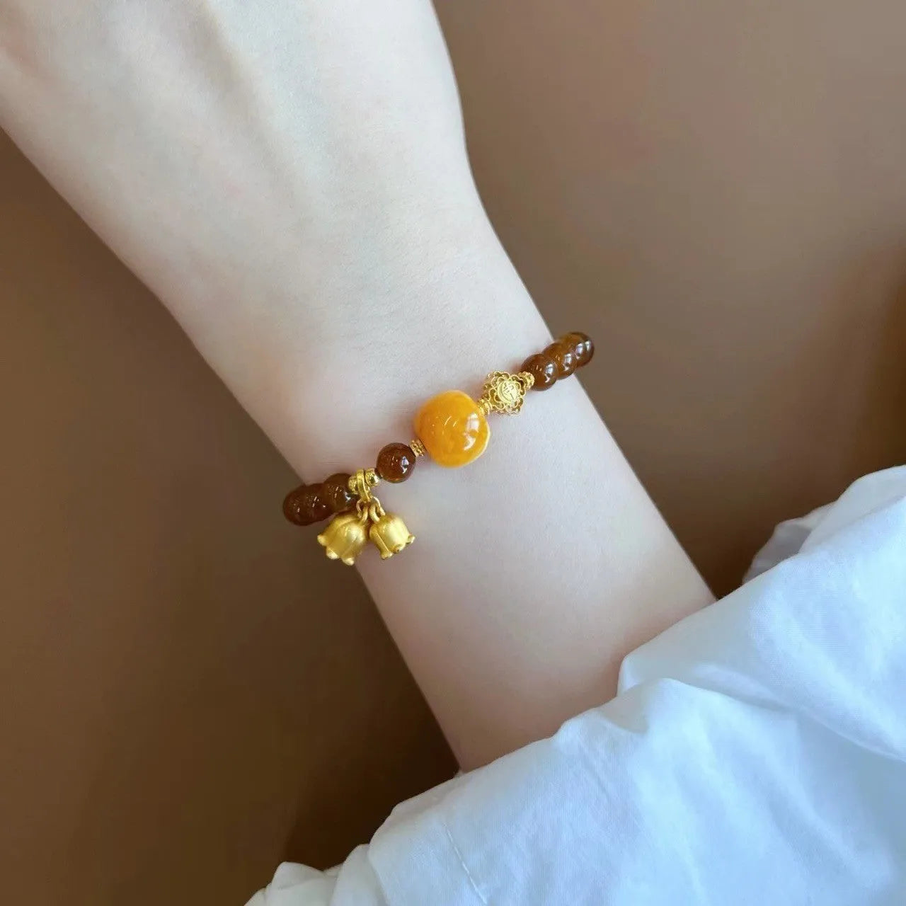 Women's caramel beeswax coloured Lily flower bracelet with electroplated finish