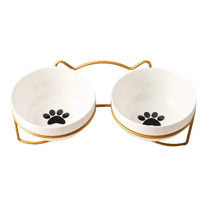 White ceramic cat bowl with decorative iron frame in cat ear design