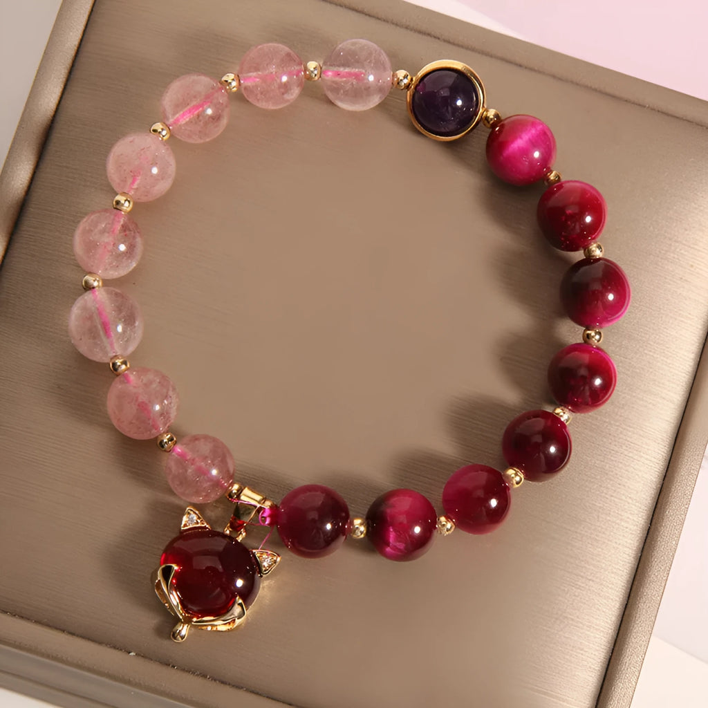Women's simple strawberry crystal bracelet on an 18cm elastic band.
