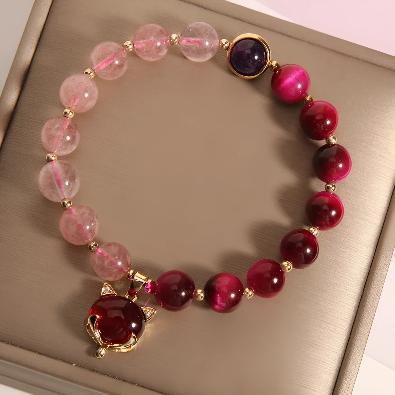 Women's simple strawberry crystal bracelet on an 18cm elastic band.