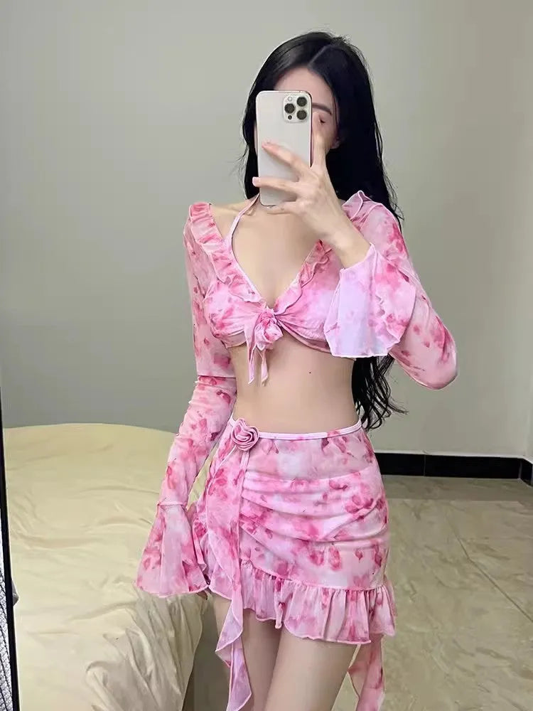 Women's floral pattern bikini swimsuit in cherry blossom pink colour.