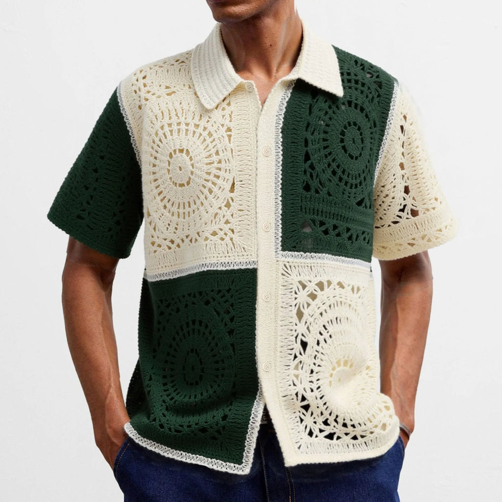 Beige colourblock men's short sleeve knitted shirt with flocking detail on a hanger.