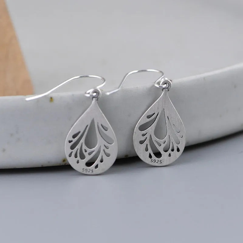925 silver hollow water drop earrings with retro craft style and grinding finish