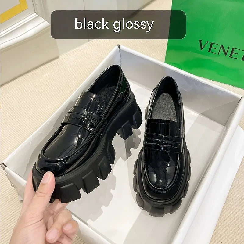 British style wide fat foot loafers in patent leather finish with rubber sole and shallow opening