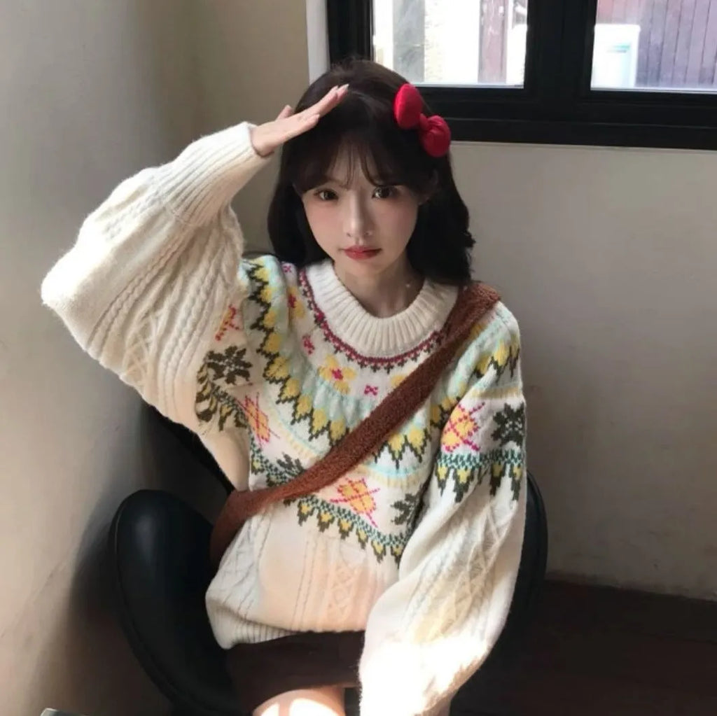 Milky white women's knitwear pullover with loose lantern sleeves and a Mori-style texture.