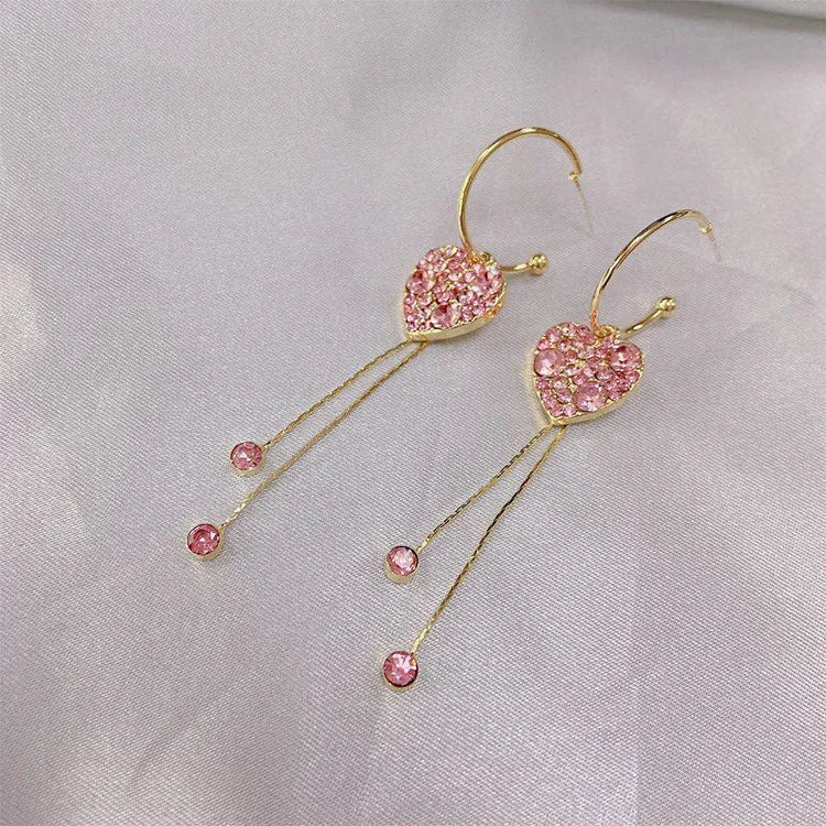 Pink heart shaped tassel earrings with frosty finish on alloy base