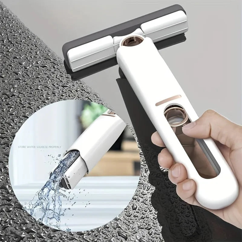 Portable self-squeeze mini mop with sponge head folded 180° for wringing, compact size for cleaning desk and window