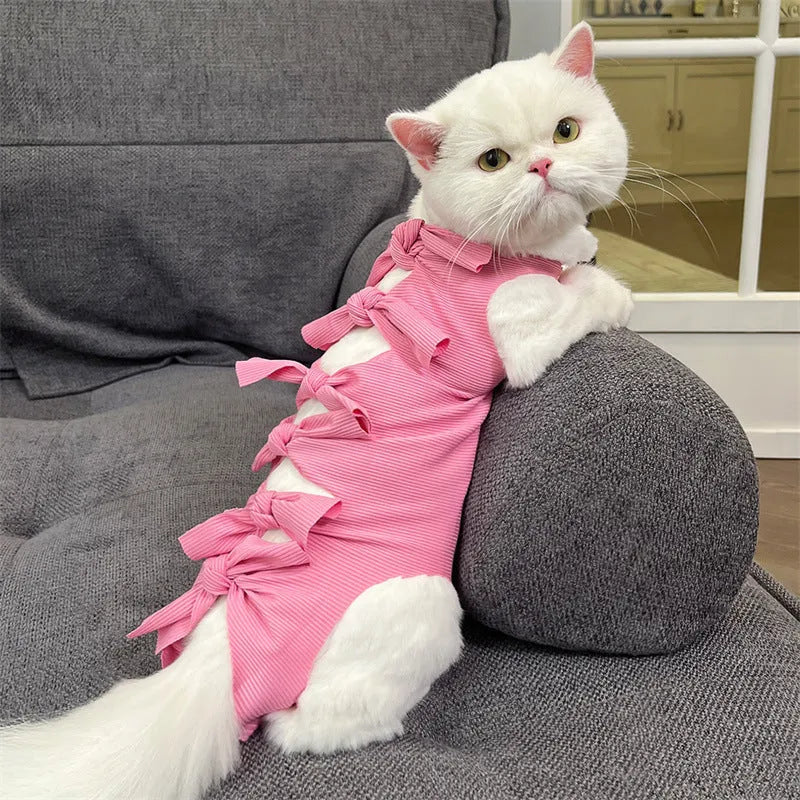 Blue lace-up polyester sterilisation clothing for a cat, shown on a size chart for S, M, and L.