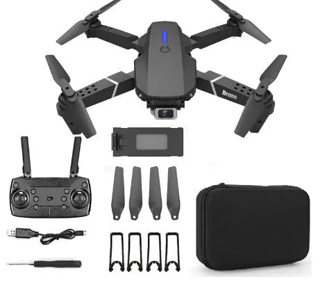 Grey foldable 4K dual camera aerial drone with remote control and spare blades