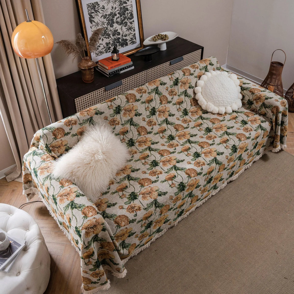 American country jacquard floral sofa cover in cherry white beard colour on a living room sofa