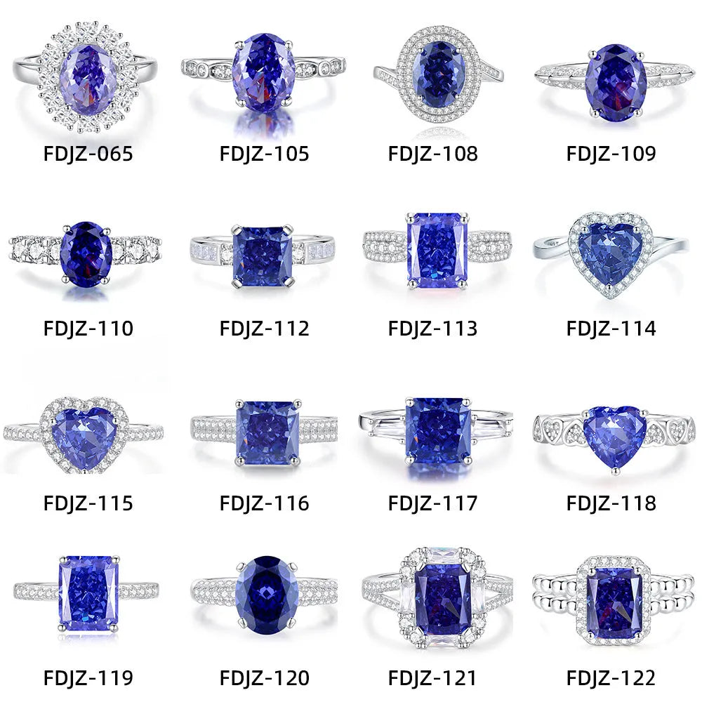 Heart-shaped sterling silver ring with a faceted colour zircon stone on a white background.