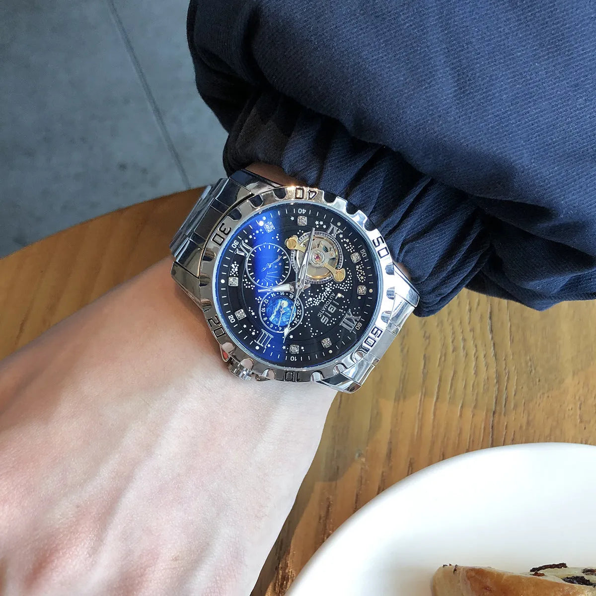 Men's silver case automatic mechanical watch with black leather strap and luminous display