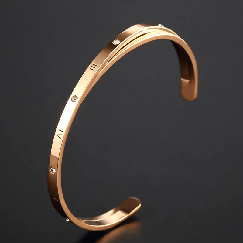 Ladies open-ended bracelet with zircon inlay in stainless steel with electroplated rose, gold or steel finish
