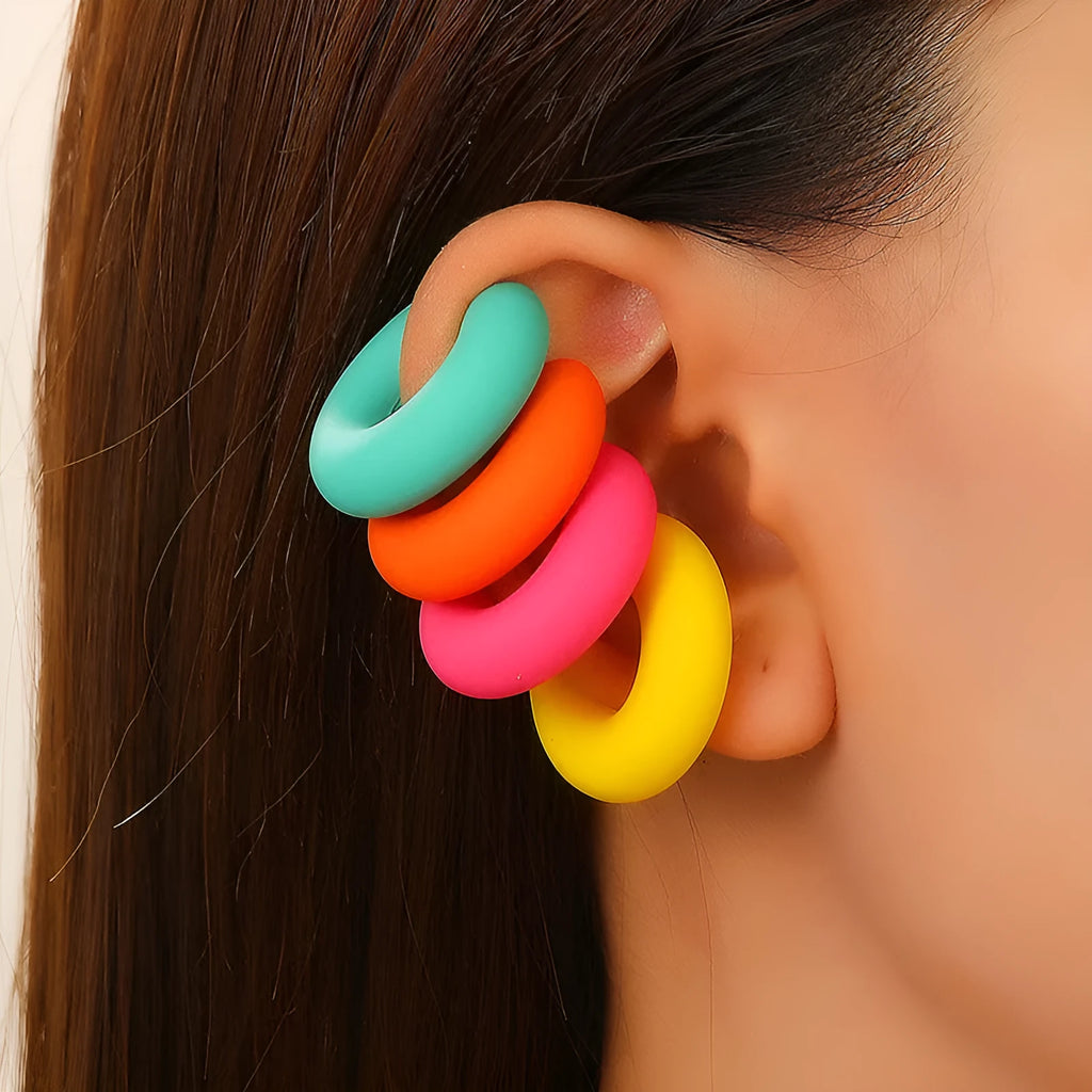 A pair of matte finish, coarse round C-shaped clip-on earrings for women in a choice of fifteen candy colours.