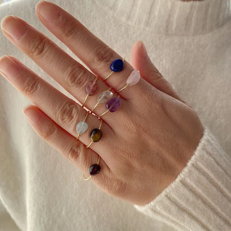 Geometric niche design agate ring for women showing eight colour variations on display