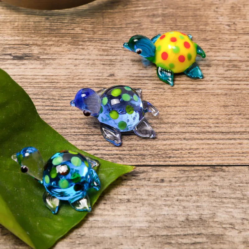 Glass crafts home ornament geometric turtle shape in blue and blue shell on desktop