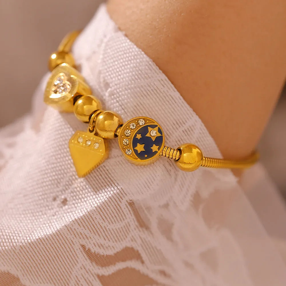 Gold stainless steel women's bracelet with heart-shaped geometric drop oil design on chain