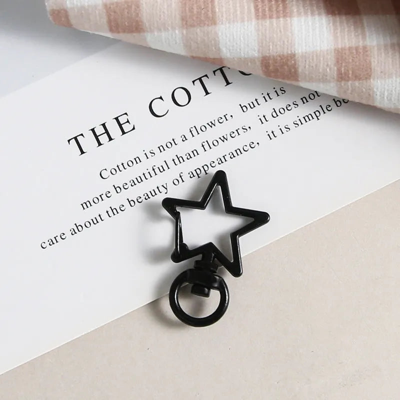 Metal five-pointed star snap button keychain with colour paint finish in alloy, small size, thirteen colour options including beige and sapphire blue
