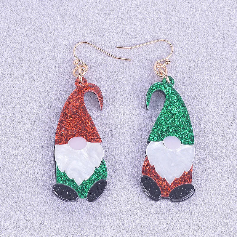 Cartoon Santa Claus character earrings in acrylic with red, green, or mixed hat styles