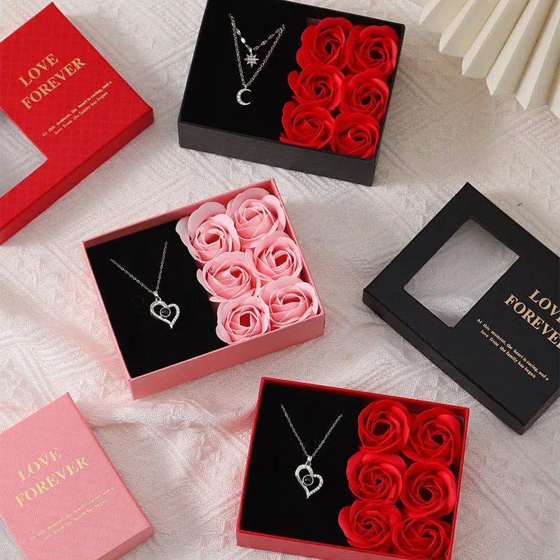 Korean style red gift box containing six pink soap flowers, with a matching handbag.