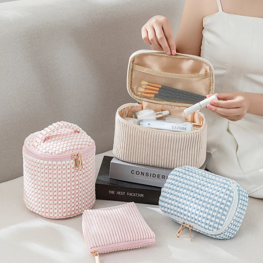 Four cube-style flannelette makeup bags in matching design with colour options including pink dots and khaki