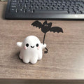 Mini resin Halloween ghost statue walking a dog and holding a bat, 4cm tall