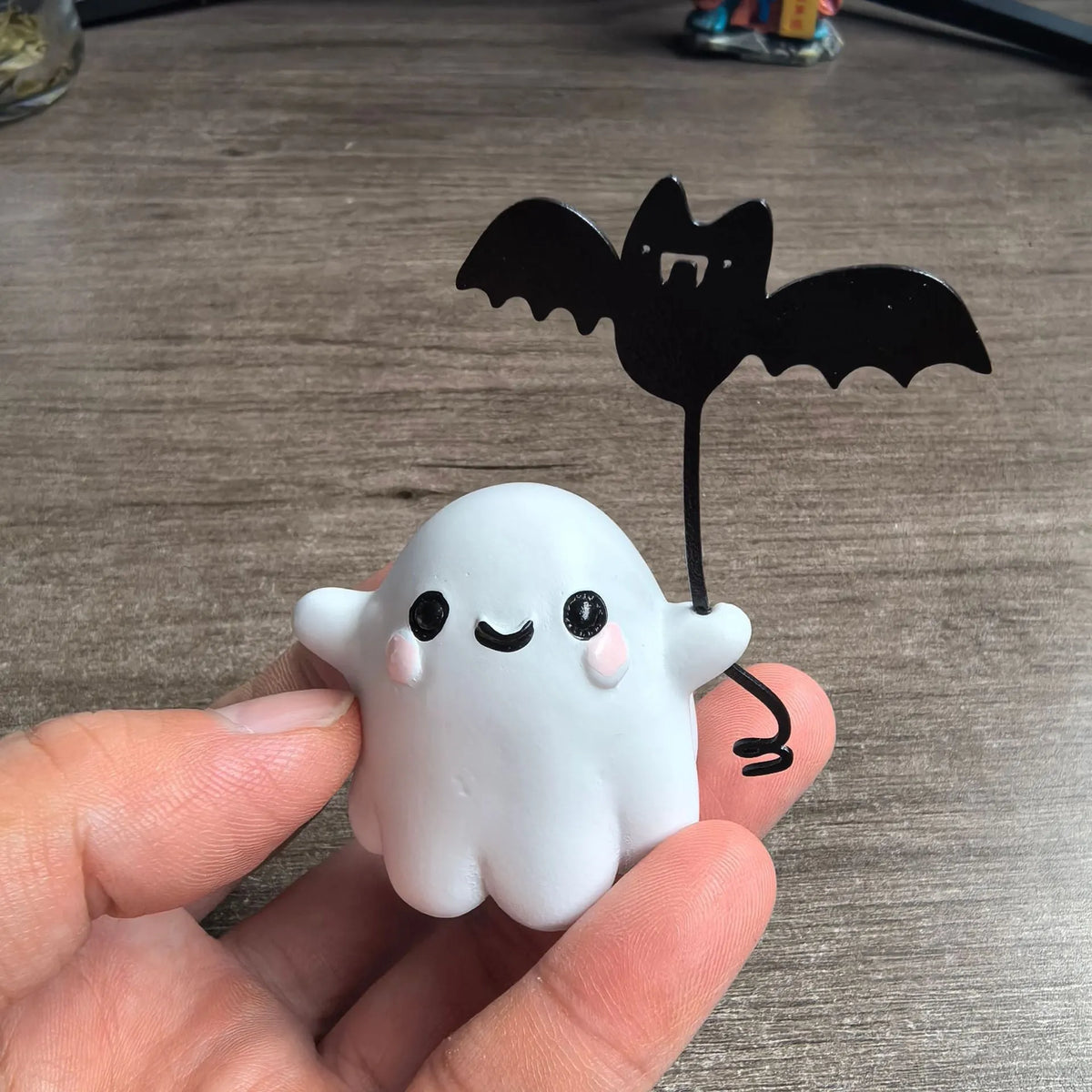 Mini resin Halloween ghost statue walking a dog and holding a bat, 4cm tall
