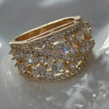Women's round hollow all-match ring in copper with gold white diamond finish on finger