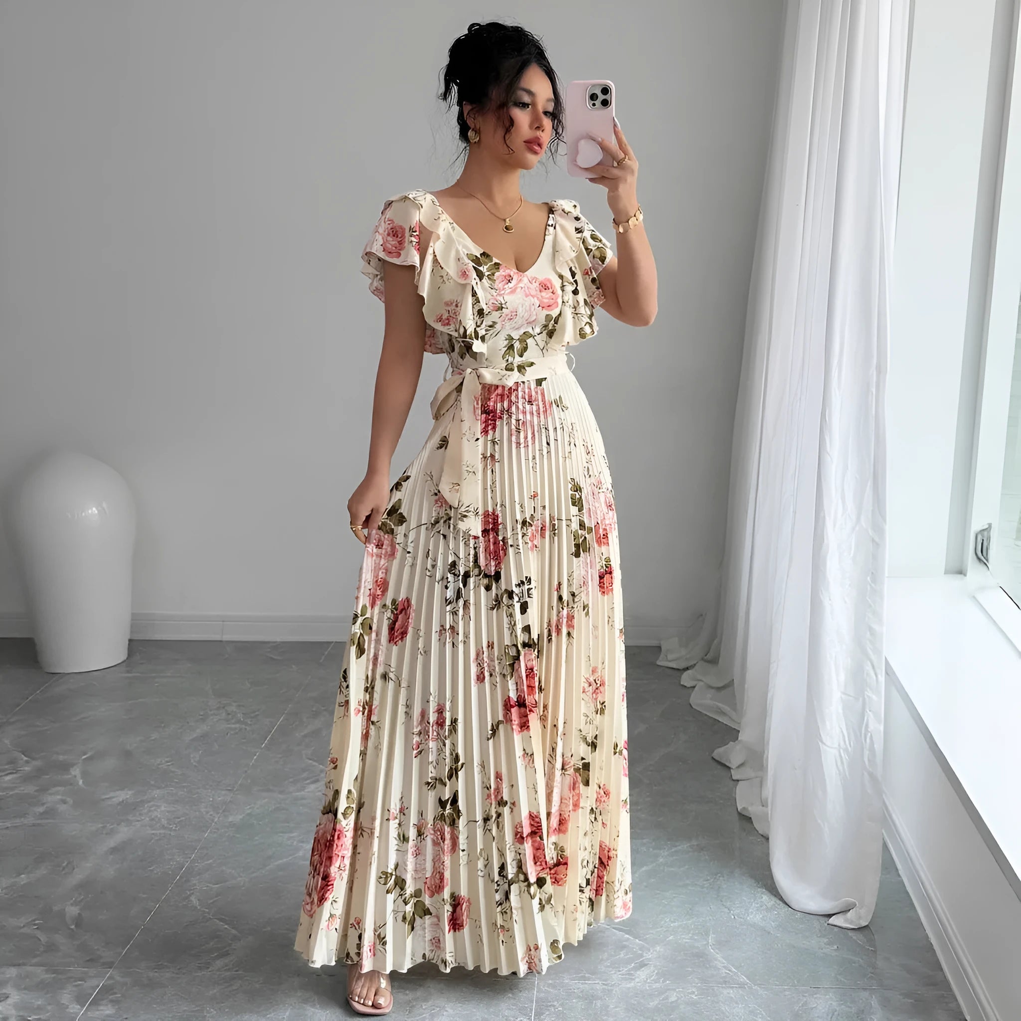 Apricot floral print women's dress with V-neck, ruffle sleeves, and a high-waisted swing skirt.