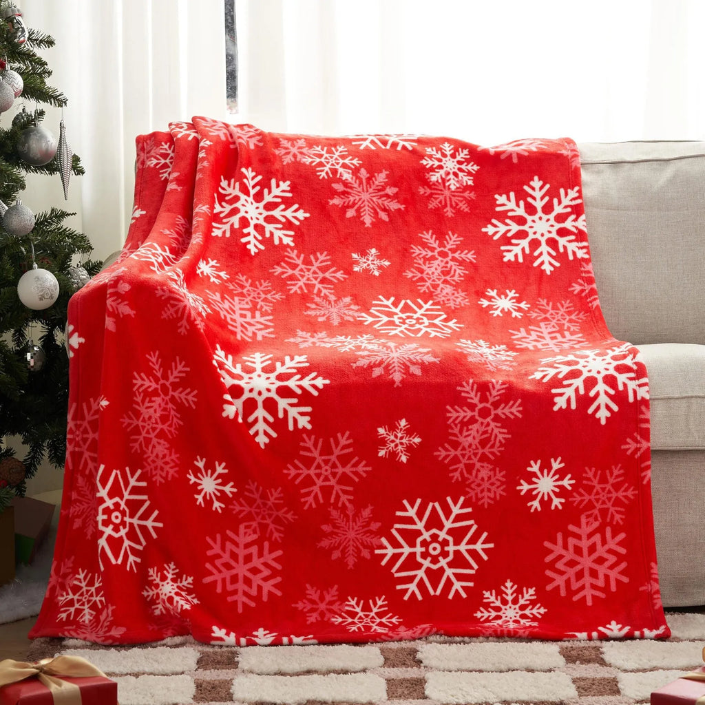 Soft flannel Christmas blanket in a plush polyester fabric, shown in one of five available colours.