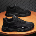 Men's black mesh fabric low top board shoes with front lace-up and plastic sole, side view