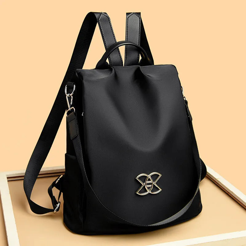 Women's nylon oxford cloth large capacity anti-theft backpack in black, brown, and sequined black