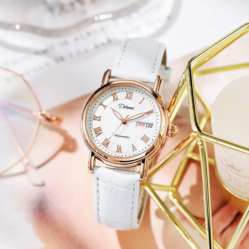 Women's automatic mechanical fashion watch with steel bracelet and white dial showing 12mm thickness