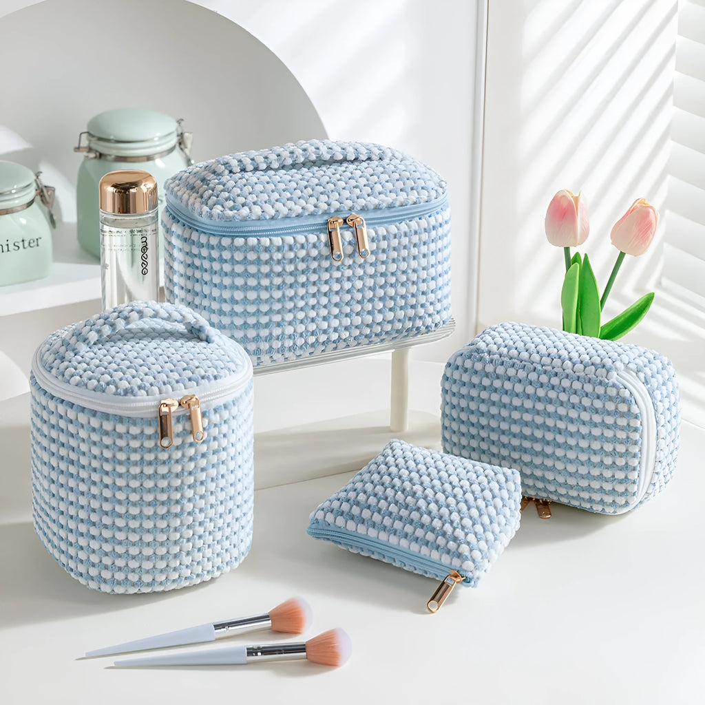 Four cube-style flannelette makeup bags in matching design with colour options including pink dots and khaki