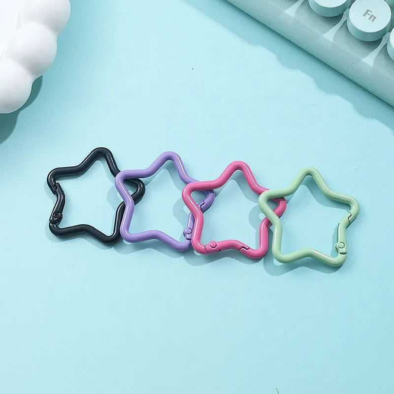 Zinc alloy five-pointed star keychain in selected colour for backpack decoration