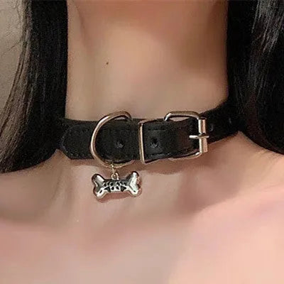 Black adjustable choker necklace with little bell charm on leather collar