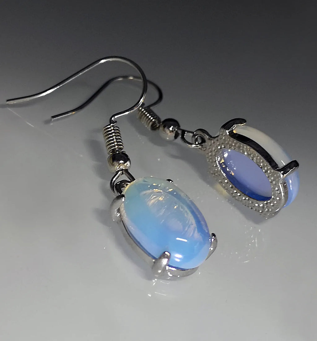 Moonlight white opal drop earrings with elliptical cross design on alloy electroplated setting