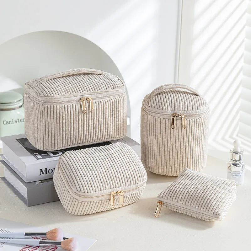 Four cube-style flannelette makeup bags in matching design with colour options including pink dots and khaki