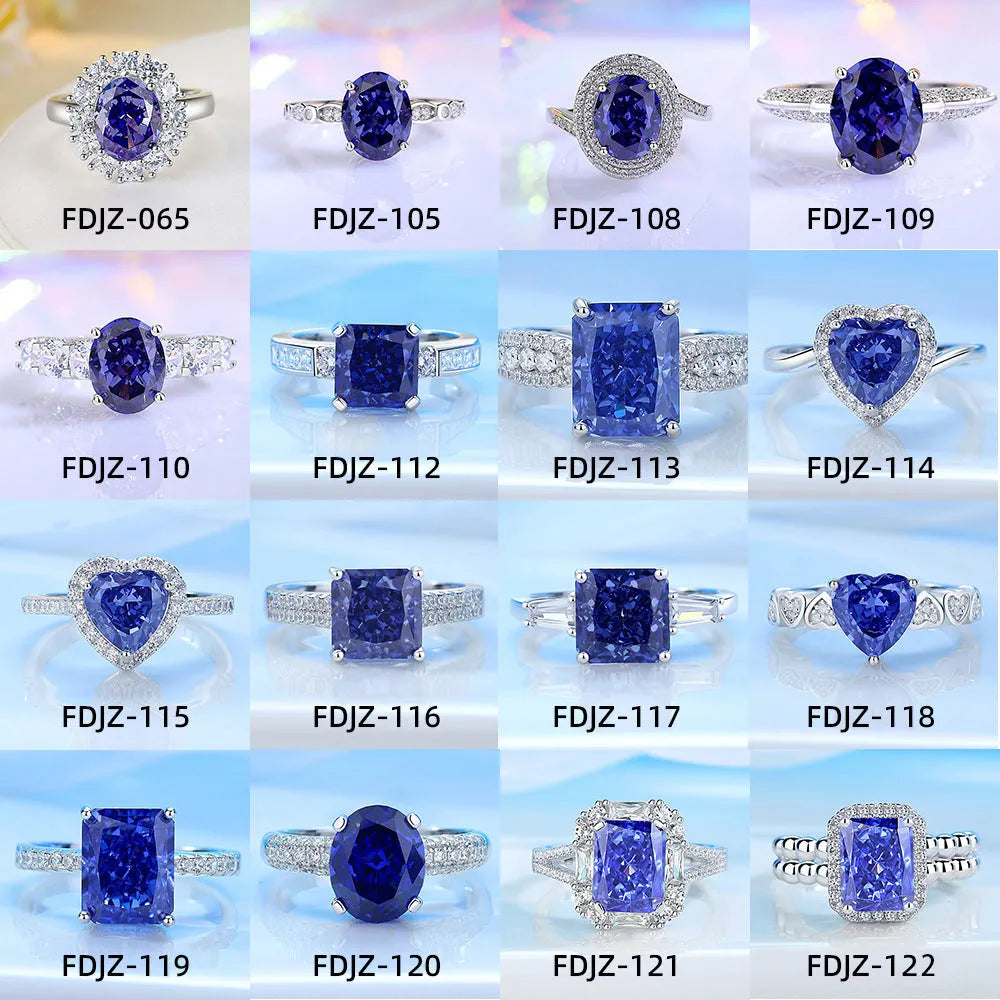 Heart-shaped sterling silver ring with a faceted colour zircon stone on a white background.