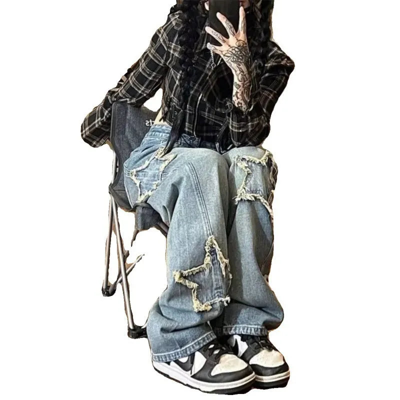 Blue women's high-waisted straight-leg denim jeans on a neutral background.