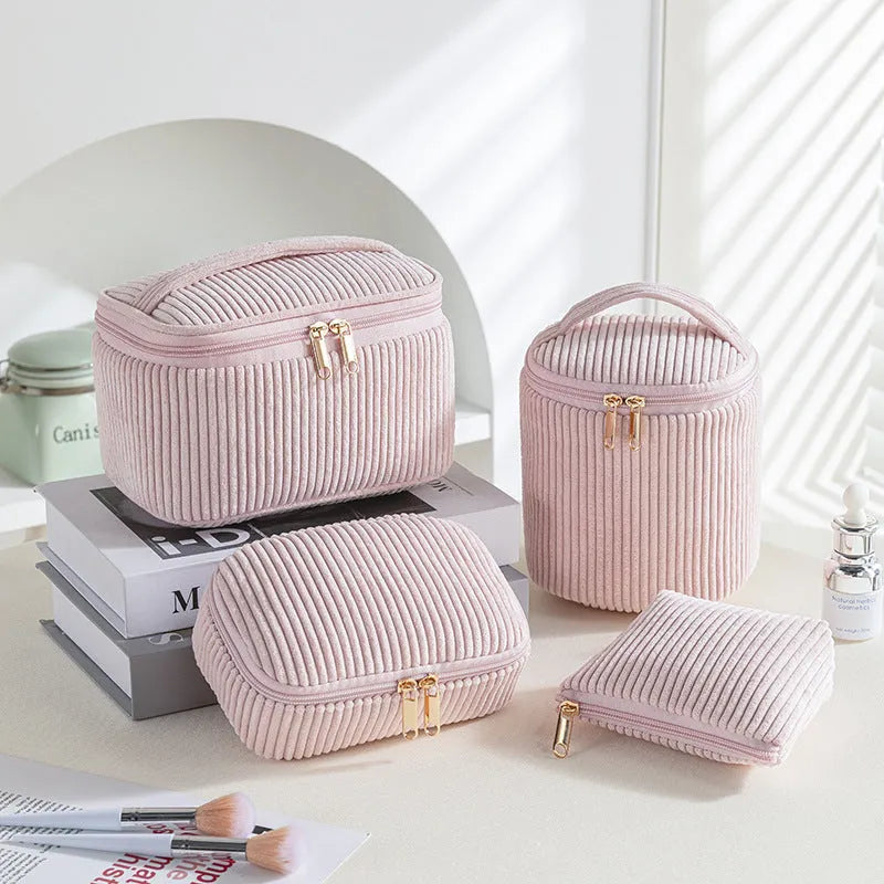 Four cube-style flannelette makeup bags in matching design with colour options including pink dots and khaki