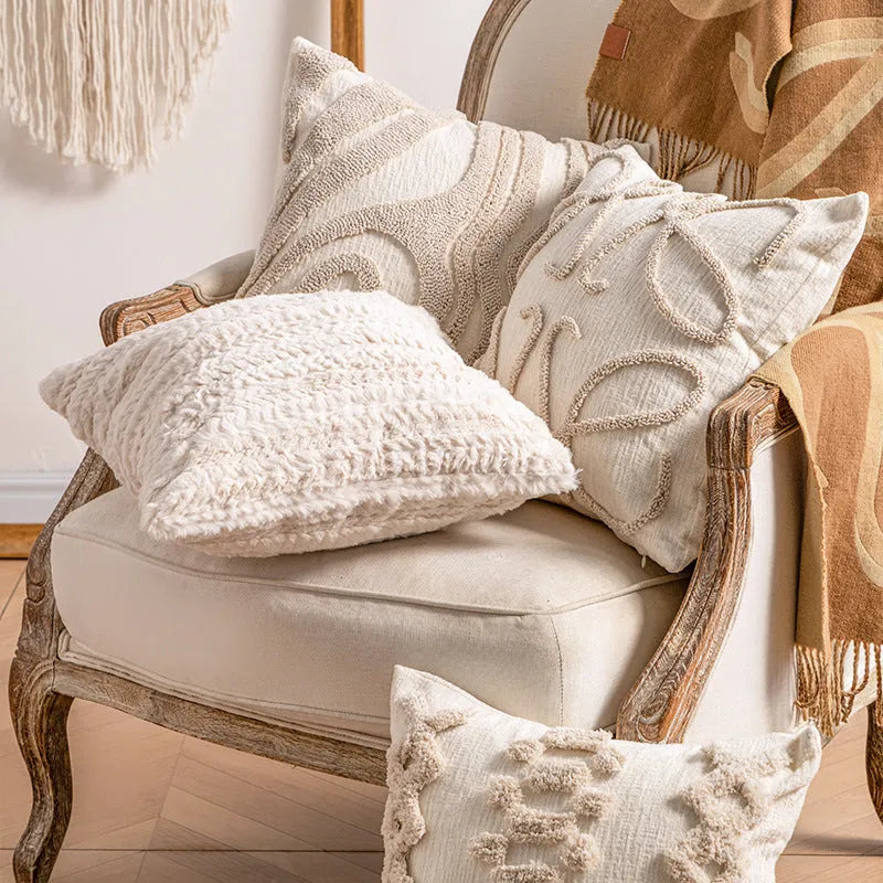 Decorative striped cushion cover with knitted tassel in a choice of six patterns and two sizes.