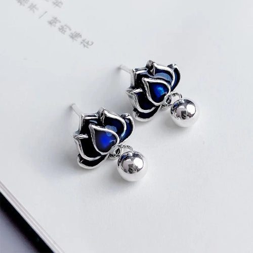 Blue lotus earrings with retro artistic design and lotus seedpod tassel, measuring 1.2cm wide