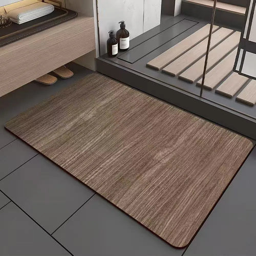 Square American-style floor mat with geometric wood grain pattern for bathroom doorway.