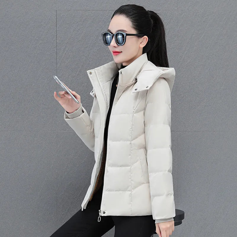 Women's short thick down jacket in black, slim fit with long sleeves and pocket detail